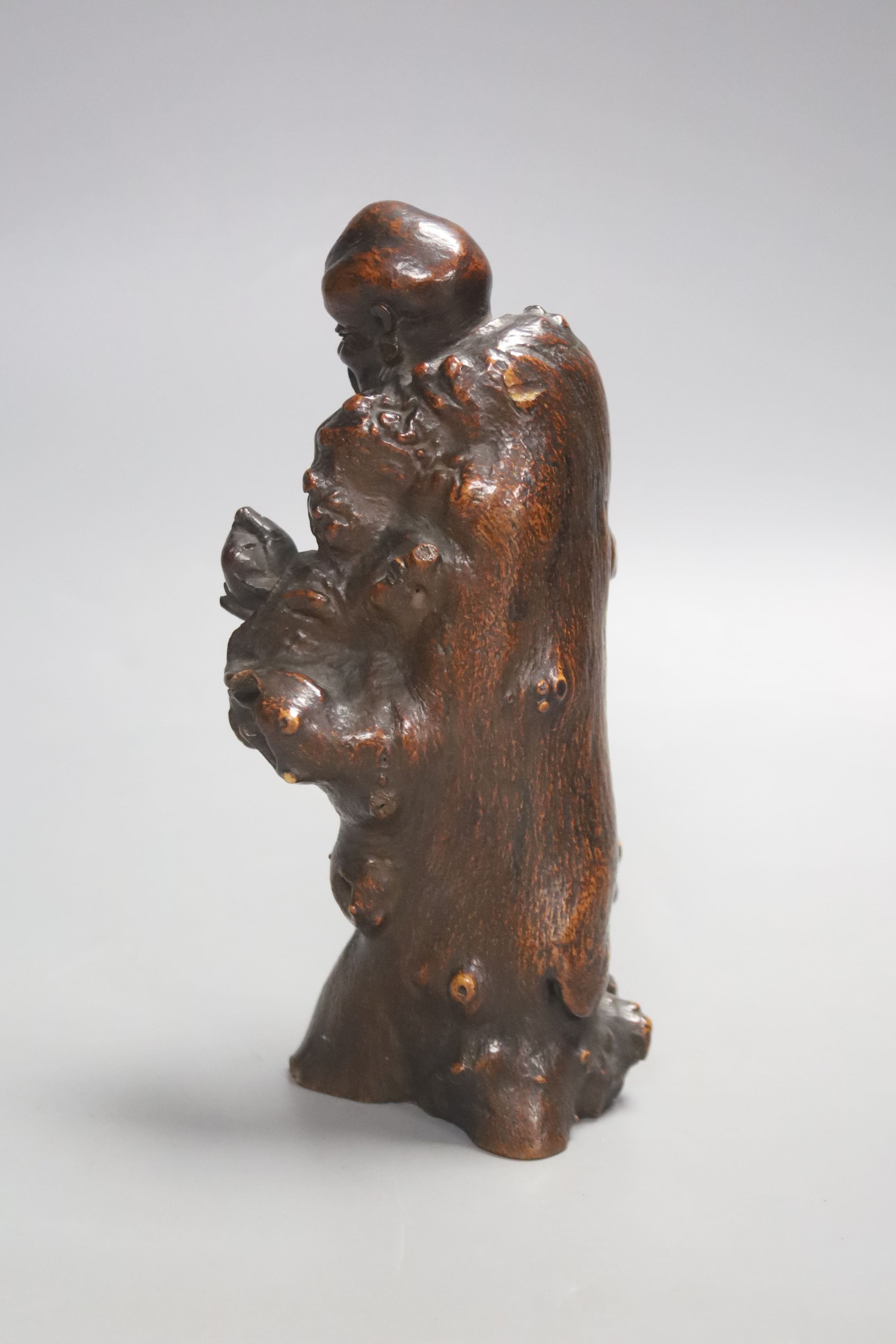 A Chinese rootwood figure of Shou Lao